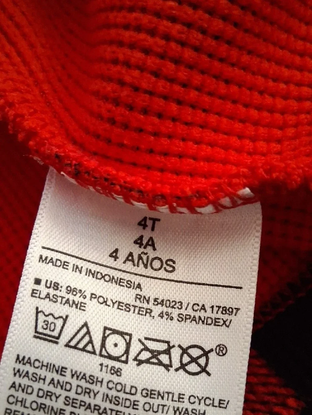 Old Navy Red and Black Buffalo-Check Crewneck Sweater With Blue Jean.
